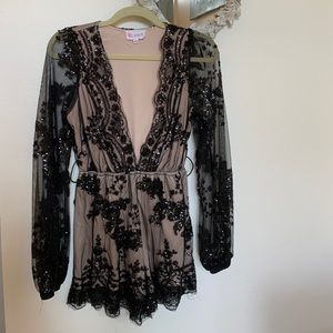 L’Atiste Sparkly Black and Nude Lace Sequin Romper